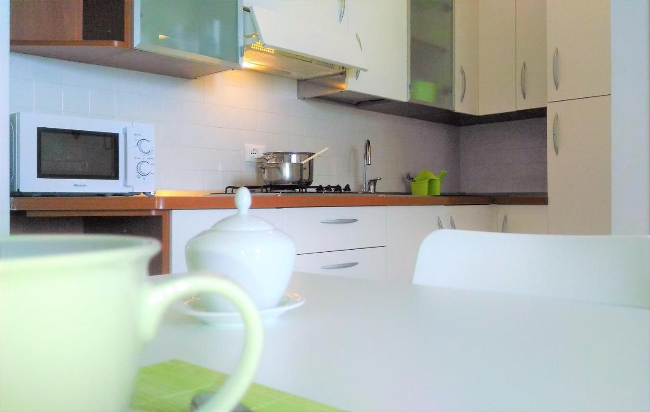 Green Holiday Wohnung Mit Schwimmbad Bibione Bagian luar foto
